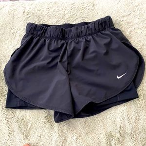 Black Nike running shorts with lining
